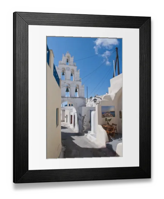 Framed Print : Church with bells in small traditional village near Kamari in Santorini in Greek Islands Framed Print : Church with bells in small traditional village near Kamari in Santorini in Greek Islands