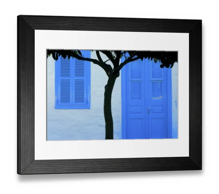 Framed Print : Greece, Island of Hydra. A lemon tree contrasts with a traditional house