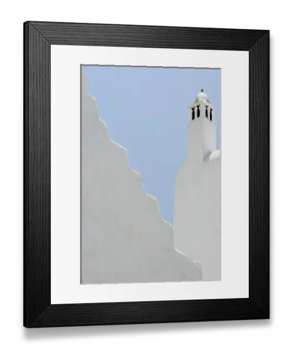 Framed Print : Greece, Mykonos, Hora. Whitechurch belfry against light blue sky and irregular wall Framed Print : Greece, Mykonos, Hora. Whitechurch belfry against light blue sky and irregular wall