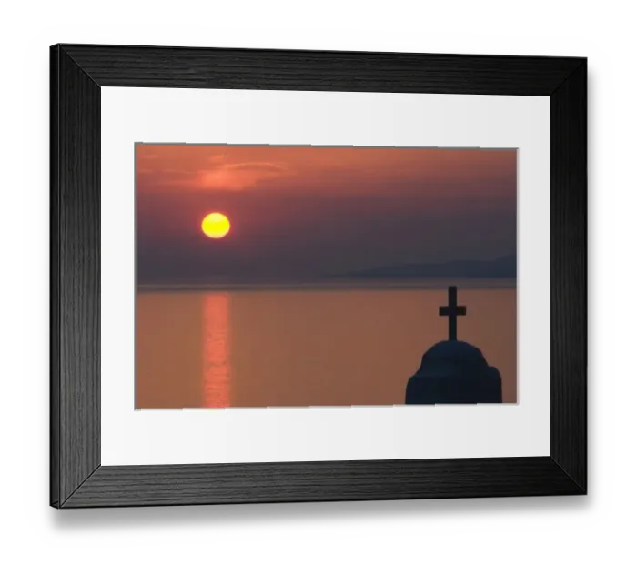 Framed Print : Greece, Mykonos, Hora. Sunset silhouettes Greek Orthodox church and cross in foreground Framed Print : Greece, Mykonos, Hora. Sunset silhouettes Greek Orthodox church and cross in foreground