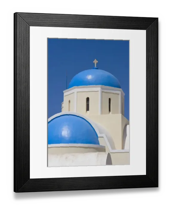 Framed Print : Greece, Santorini, Thira, Oia. Blue Greek Orthodox church domes against blue sky
