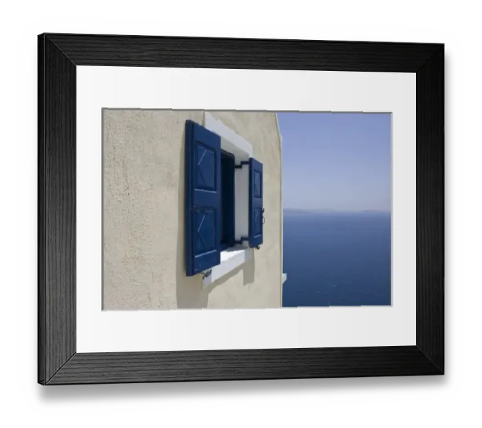 Framed Print : Greece, Santorini, Thira, Oia. Blue-shuttered window in pale yellow wall overlooking blue sea Framed Print : Greece, Santorini, Thira, Oia. Blue-shuttered window in pale yellow wall overlooking blue sea