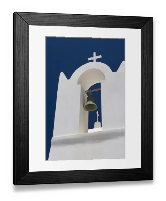 Framed Print : Greece, Santorini. White church bell tower against dark blue sky