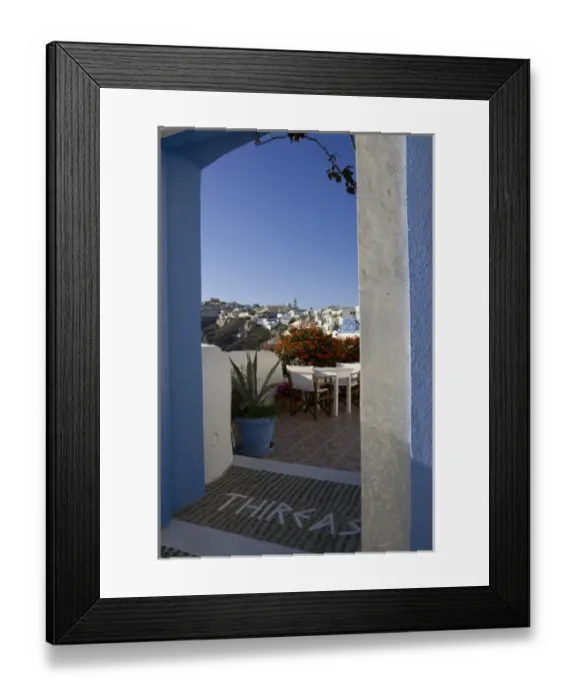 Framed Print : Greece, Santorini. Doorway to balcony tables at Thireas Restaurant