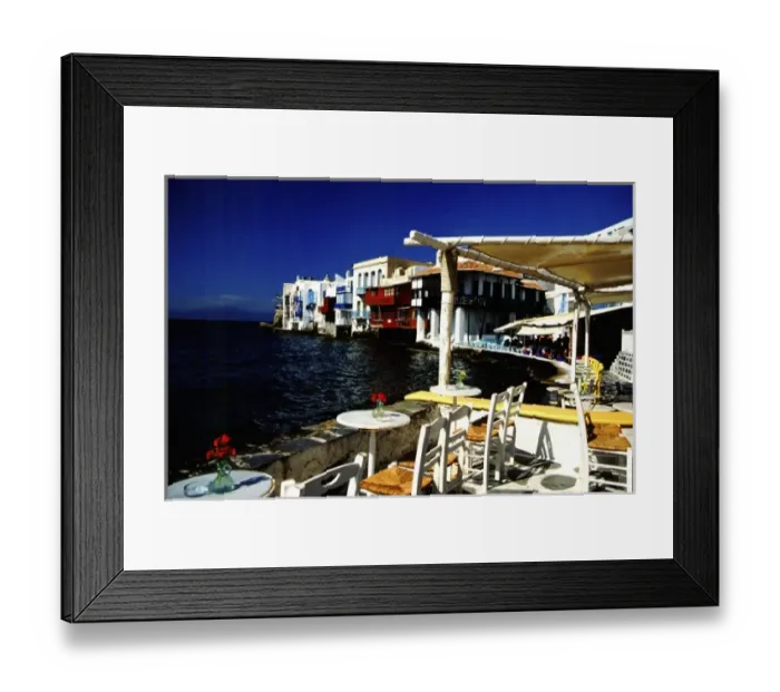Framed Print : Greece, Aegean Sea, Mykonos. Seaside cafe on the Aegean Sea