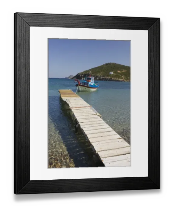 Framed Print : GREECE, Dodecanese Islands, PATMOS, Kampos: Shore view with small boat / Livadi Geranos Framed Print : GREECE, Dodecanese Islands, PATMOS, Kampos: Shore view with small boat / Livadi Geranos