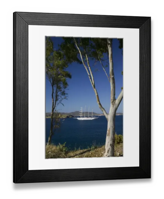 Framed Print : GREECE, Dodecanese Islands, PATMOS, Skala: Sailing Cruiseship at Anchor  /  Skala Bay
