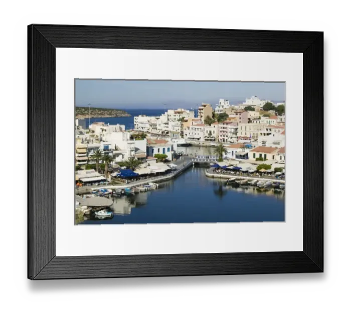 Framed Print : GREECE, CRETE, Lasithi Province, Agios Nikolaos: Afternoon Town view by Lake Voulismeni Framed Print : GREECE, CRETE, Lasithi Province, Agios Nikolaos: Afternoon Town view by Lake Voulismeni