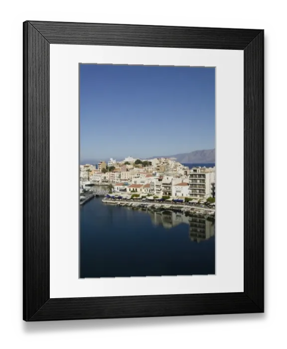 Framed Print : GREECE, CRETE, Lasithi Province, Agios Nikolaos: Afternoon Town view by Lake Voulismeni Framed Print : GREECE, CRETE, Lasithi Province, Agios Nikolaos: Afternoon Town view by Lake Voulismeni