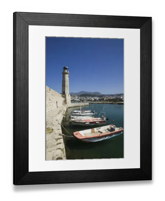 Framed Print : GREECE, CRETE, Rethymno Province, Rethymno: Venetian Harbor with lighthouse  /  Daytime