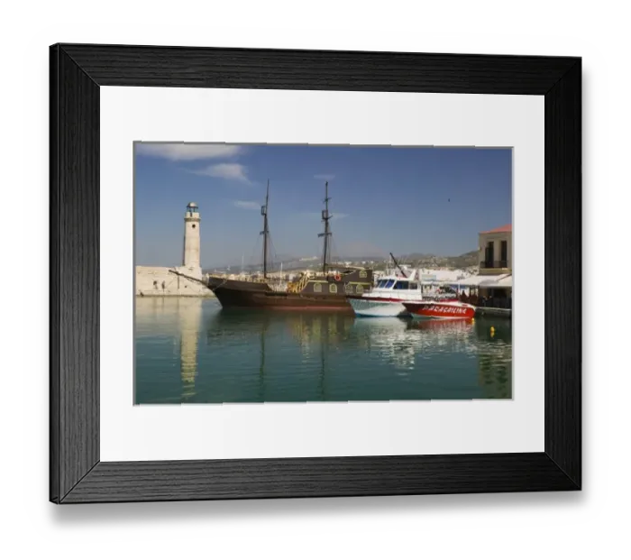 Framed Print : GREECE, CRETE, Rethymno Province, Rethymno: Venetian Harbor with lighthouse  /  Daytime