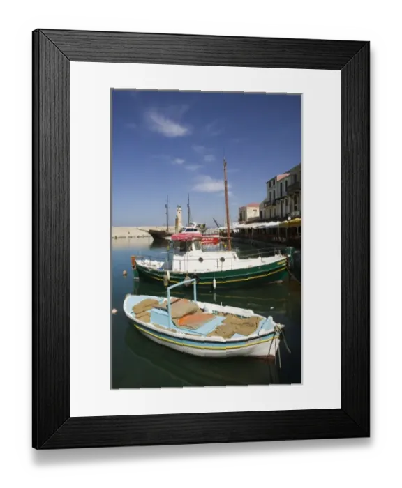 Framed Print : GREECE, CRETE, Rethymno Province, Rethymno: Venetian Harbor with lighthouse  /  Daytime