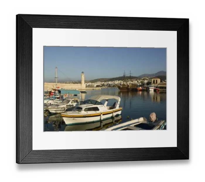 Framed Print : GREECE, CRETE, Rethymno Province, Rethymno: Venetian Harbor with lighthouse  /  Sunset