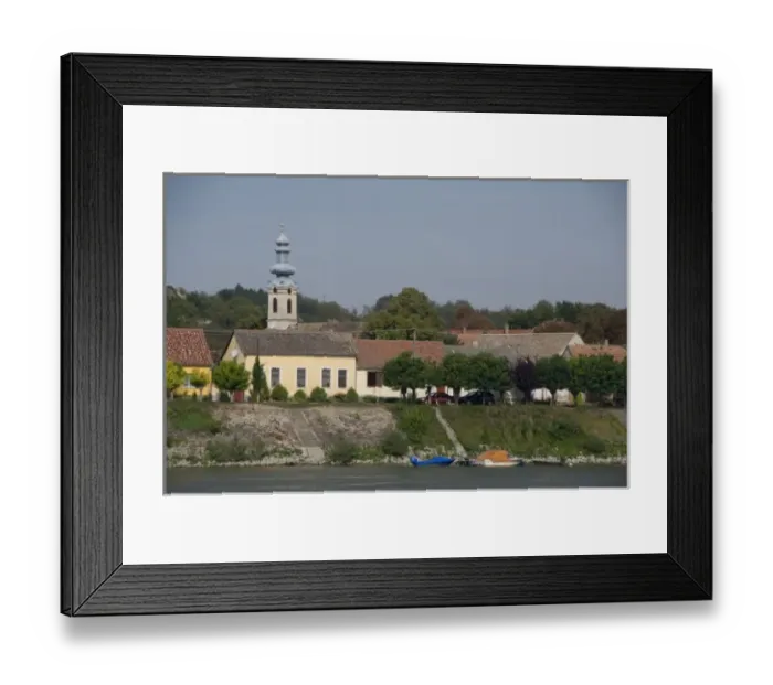 Framed Print : Hungary. Danube River view near Kalocsa. Typical waterfront village with clock tower Framed Print : Hungary. Danube River view near Kalocsa. Typical waterfront village with clock tower
