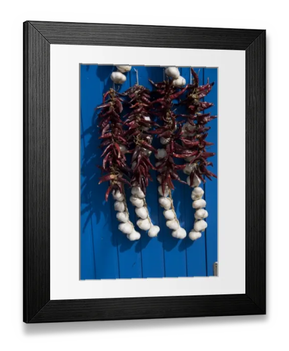 Framed Print : Hungary, Kalocsa. Fresh garlic and local sweet paprika hanging on blue door Framed Print : Hungary, Kalocsa. Fresh garlic and local sweet paprika hanging on blue door