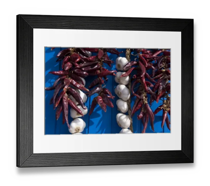 Framed Print : Hungary, Kalocsa. Fresh garlic and local sweet paprika hanging on blue door Framed Print : Hungary, Kalocsa. Fresh garlic and local sweet paprika hanging on blue door