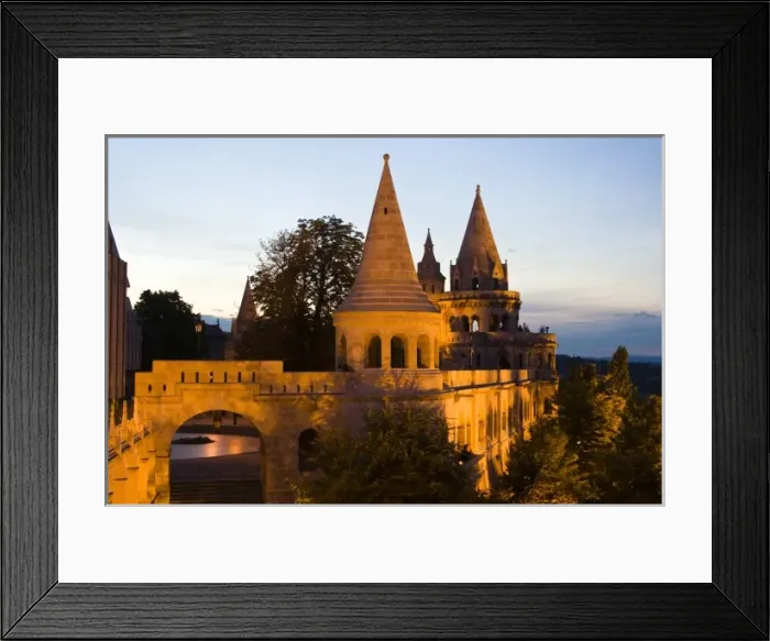 Framed Print : The terrace and conical towers of Fishermens Bastion next to Matyas Church, dusk