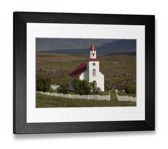 Framed Print : Church and farm in pastoral valley at foot of Mt. Helgafell in southwest Iceland