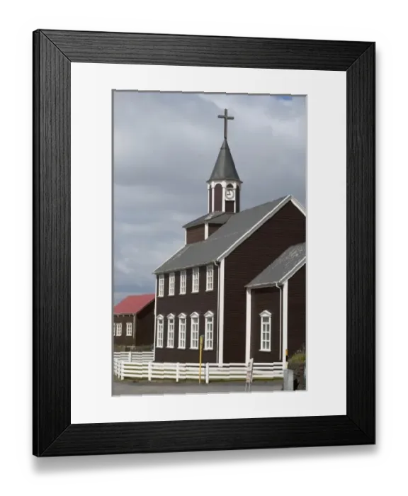 Framed Print : Historic seaside church in quaint hamlet of Vik, Iceland