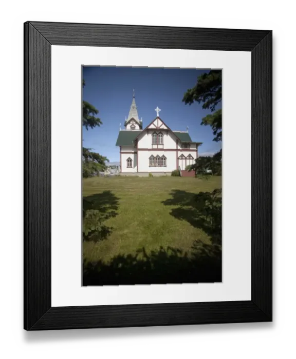 Framed Print : Husavik, Icelands cross-shaped church over looking the harbor is the port citys landmark Framed Print : Husavik, Icelands cross-shaped church over looking the harbor is the port citys landmark