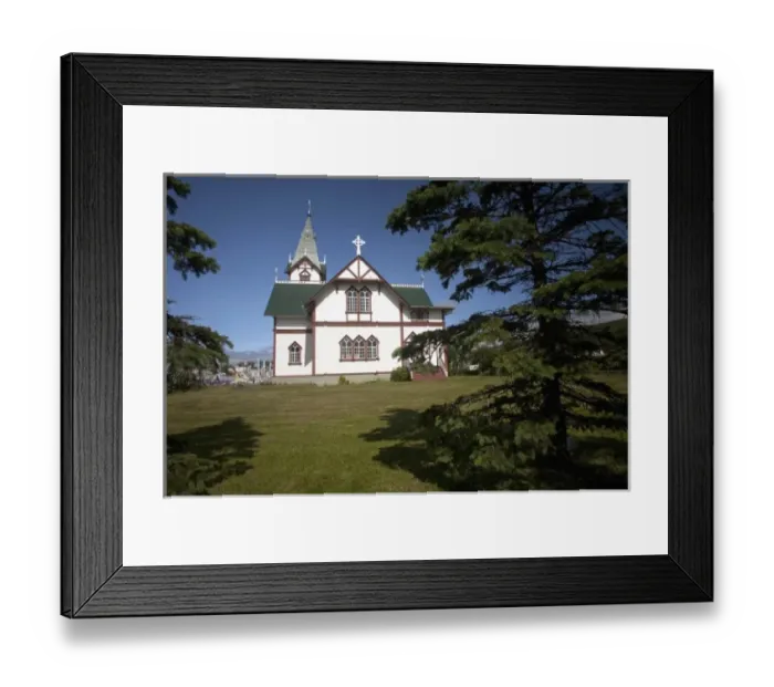 Framed Print : Husavik, Icelands cross-shaped church over looking the harbor is the port citys landmark Framed Print : Husavik, Icelands cross-shaped church over looking the harbor is the port citys landmark