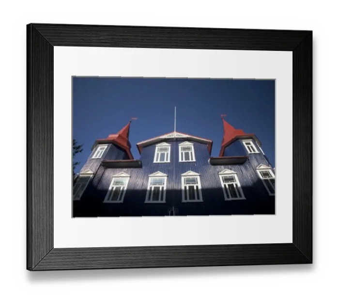 Framed Print : Unique corrugated metal siding of buildings adds to the Port of Akureyris unique charm Framed Print : Unique corrugated metal siding of buildings adds to the Port of Akureyris unique charm