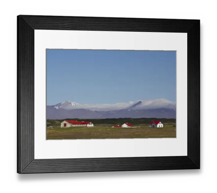 Framed Print : Europe, Iceland, West Fjords, scenic landscape of barn and houses in foreground against mountains Framed Print : Europe, Iceland, West Fjords, scenic landscape of barn and houses in foreground against mountains