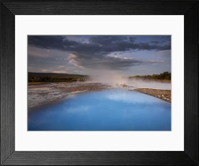Framed Print : Iceland, Geysir, Rising sun lights deep blue thermal pool and steam venting