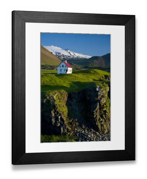 Framed Print : House near basaltic columns with Snaefellsjokull Volcano in the background Framed Print : House near basaltic columns with Snaefellsjokull Volcano in the background