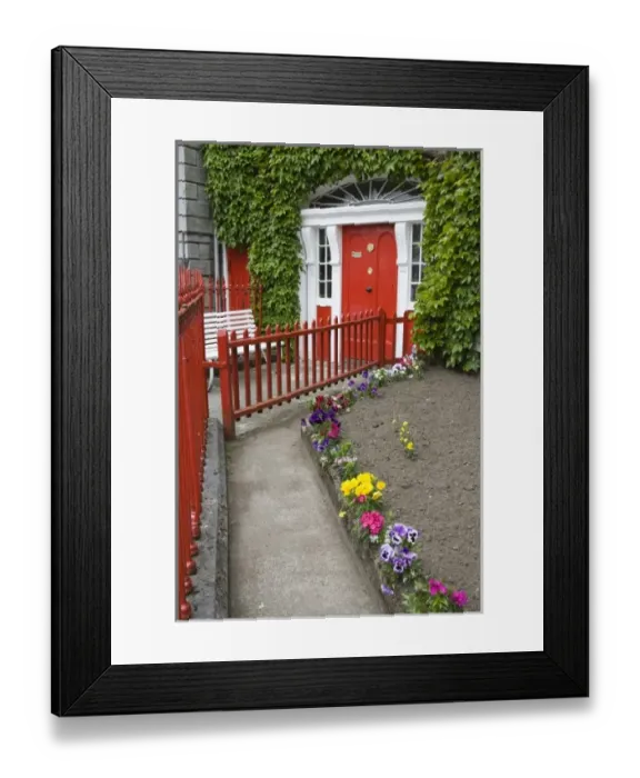 Framed Print : Ireland, County Mayo, Westport. Walkway leading to an ivy-covered house with a red door Framed Print : Ireland, County Mayo, Westport. Walkway leading to an ivy-covered house with a red door