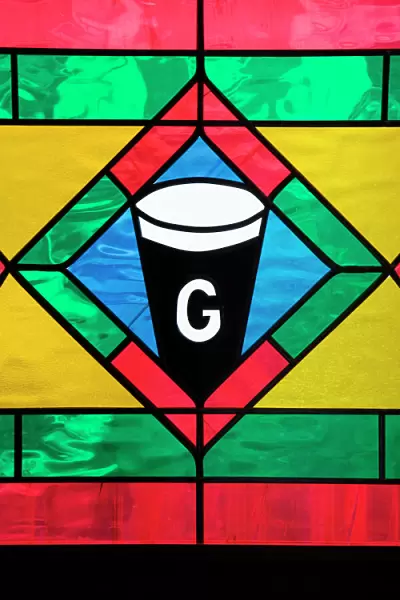 Ireland, Cashel. Stained glass window in a pub