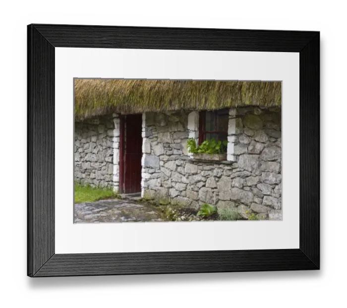 Framed Print : Ireland, Bunratty, County Clare. Traditional thatch and stone cottage in Bunratty Castle