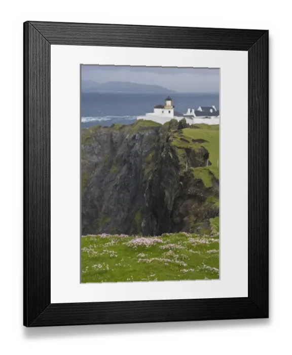 Framed Print : Ireland, County Mayo, Achill Island Lighthouse and dramatic cliffs above the Atlantic Ocean Framed Print : Ireland, County Mayo, Achill Island Lighthouse and dramatic cliffs above the Atlantic Ocean
