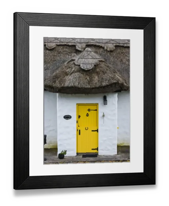 Framed Print : Ireland, Achill Island. Yellow doorway on a thatch roof cottage Framed Print : Ireland, Achill Island. Yellow doorway on a thatch roof cottage