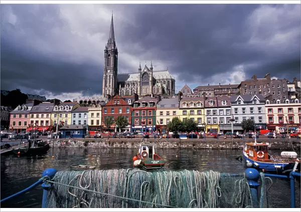 Ireland, County Cork, Cobh. Harbor view and St. Colmans church