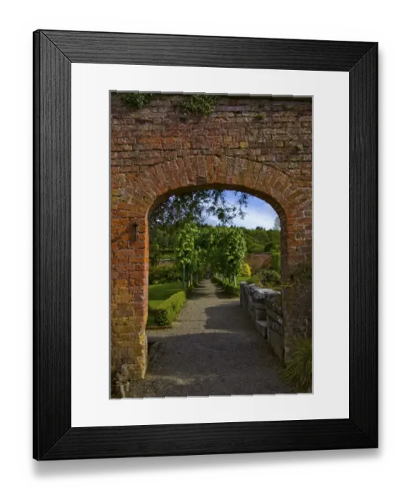 Framed Print : Ireland, the Dromoland Castle Walled Garden path through a brick archway
