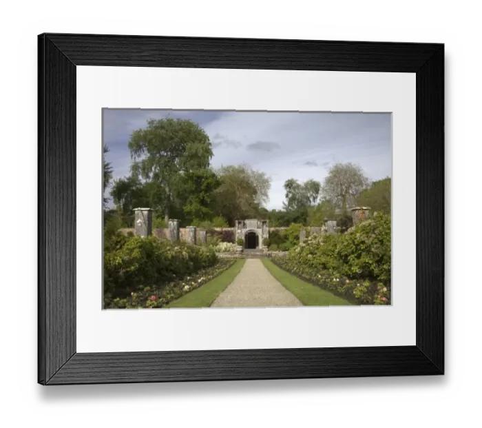 Framed Print : Ireland, the Dromoland Castle Walled Garden path through a brick archway and Leamaneh