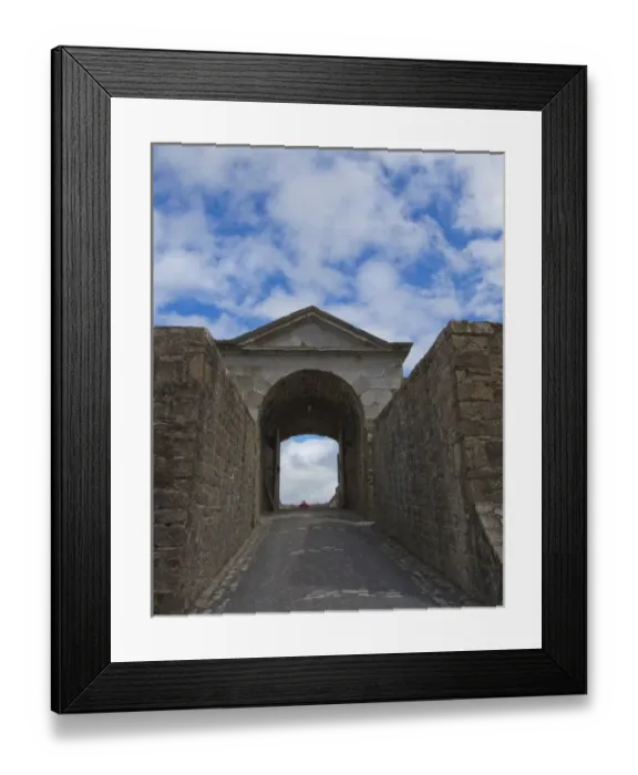 Framed Print : Charles Fort entrance into the 17th Century walled fort outside Kinsale with a bright blue sky