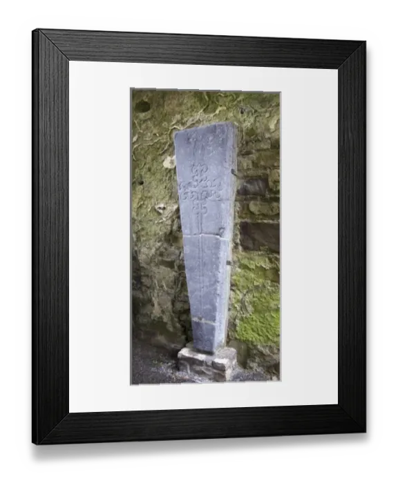 Framed Print : Medieval stone crarved headstone at Jerpoint Abbey in Kilkenny, Ireland Framed Print : Medieval stone crarved headstone at Jerpoint Abbey in Kilkenny, Ireland