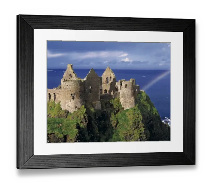Framed Print : A rainbow strikes medieval Dunluce Castle on the Antrim Coast in Co. Antrim in Northern Ireland Framed Print : A rainbow strikes medieval Dunluce Castle on the Antrim Coast in Co. Antrim in Northern Ireland