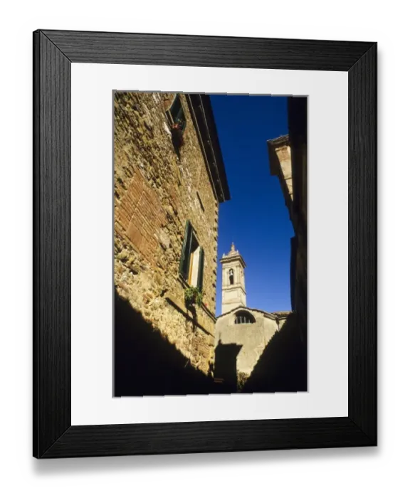 Framed Print : Italy: Tuscany, Castelmuzio, brick homes, windows with green shutters, with church Framed Print : Italy: Tuscany, Castelmuzio, brick homes, windows with green shutters, with church