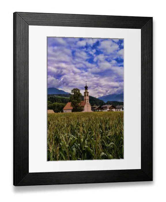 Framed Print : Beautiful church of St Lorenzo di Sebato with corn fields in the Italian Dolomites