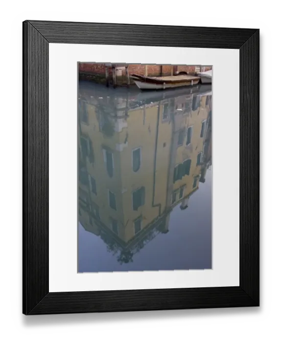 Framed Print : Italy, Venice. Building and boat reflected in still canal Framed Print : Italy, Venice. Building and boat reflected in still canal