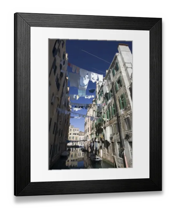 Framed Print : Italy, Venice. Laundry strung between buildings in the Ghetto Framed Print : Italy, Venice. Laundry strung between buildings in the Ghetto