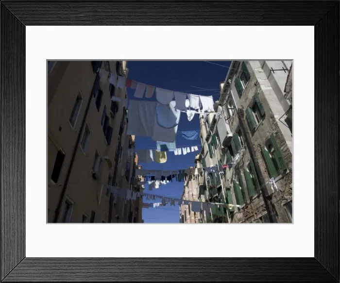 Framed Print : Italy, Venice. Laundry strung between buildings in the Ghetto