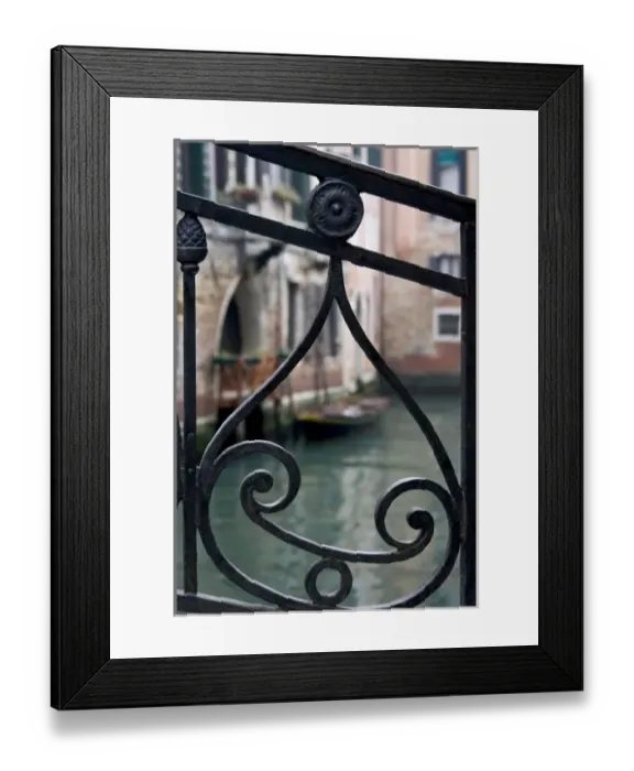 Framed Print : Italy, Venice. Stair railing metalwork design frames canal with gondola