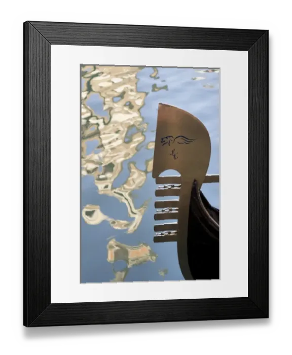 Framed Print : Italy, Venice. Gondola bow and water reflection