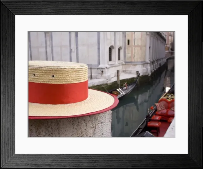 Framed Print : Italy, Venice. Detail of a gondoliers hat with the canal and gondolas in the background Framed Print : Italy, Venice. Detail of a gondoliers hat with the canal and gondolas in the background