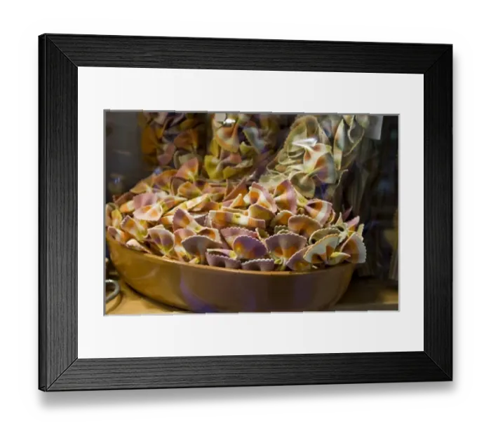 Framed Print : Italy, Venice. A bowl of colorful pasta bow ties