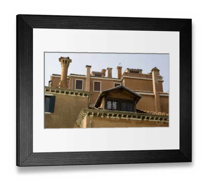 Framed Print : Italy, Venice. Tiled roofs, chimneys and windows of a colorful building Framed Print : Italy, Venice. Tiled roofs, chimneys and windows of a colorful building